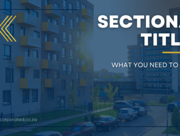 A decorative image advertising the blog article. An apartment building block with a blue filter over the photo. The text on the photo reads: "Sectional Titles: What You Need to Know"